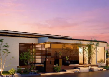 中央に鏡面の外壁をあしらった都会的で洗練された佇まい