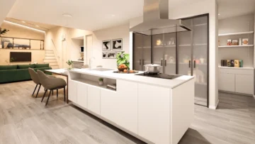 生活感を美しくカバーする壁面収納と大容量のパントリー付きのキッチン