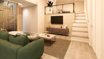 勾配天井の高さを利用したロフト付きのリビング